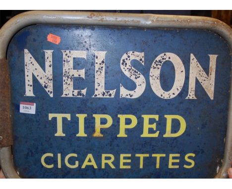 A double-sided enamel advertising sign for Nelson tipped cigarettes, with original wall bracket