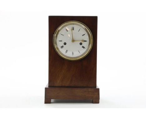 Mohogany table clock, 19th. Century, with run and striking,  presumably France, h. 29 cm.Mahonie tafelklok met gaand en slagw