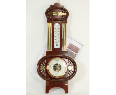 Barometer and thermometer in Art Nouveau basswood cabinet with copper decoration, maker Emil Scholz for optician Bert Leeuwar