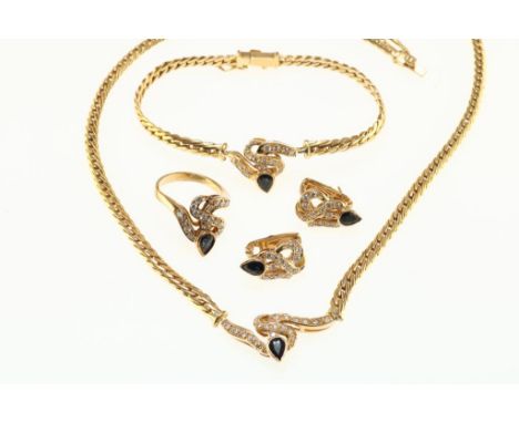 Yellow gold parure with necklace, ring, earrings, set with blue sapphires and diamonds brilliant cut approx. 2.5 ct. (set mea