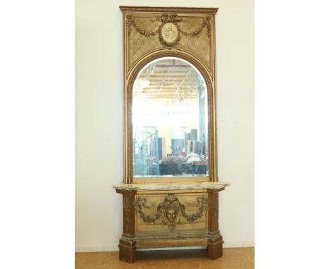 Mirror in gilded Louis XVI-style frame with medaillon, bow and  garland, 165 x 94 cm. (frame with defects) on gilded console 