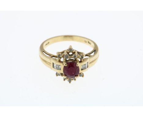 A golden ring mounted with ruby and diamond, gr.w. 3.8gr.Gouden ring bezet met robijn en diamant, br.gew. 3.8gr. ringmaat  16