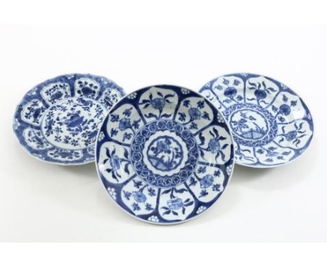 Porcelain scalloped Kangxi dish decorated with shrubs, in  medaillions, hereby pair of porcelain plates, decorated with  flow