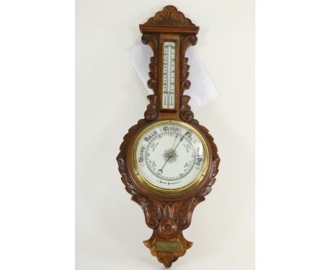 Oak wood Arts and Crafts barometer with ceramic scale plates and thermometer, England, with copper label: "gifted to mister C