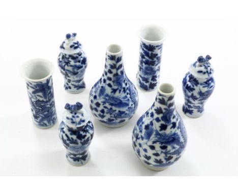 A set of 3 porcelain miniature Kangxi vases with cover and 2  vases, with on top Qilin, decorated with dragon and flowers,  C