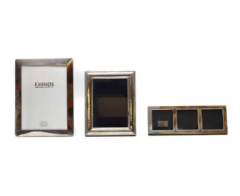 A group of three silver photograph frames of varying sizes, the largest by Kitney &amp; Co, London 2008, 21.4 x 16.3cm overal