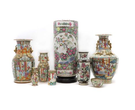 A collection of Chinese Canton famille rose, early 20th century, three vases of baluster form applied with Buddhist lion hand