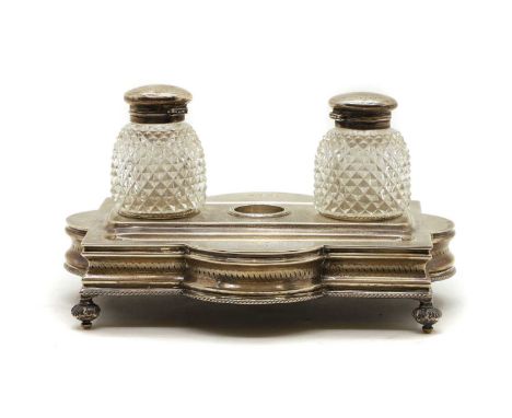 A Victorian silver inkstand, by Walker &amp; Hall, Sheffield 1893, raised on four feet with engraved foliate design and inscr