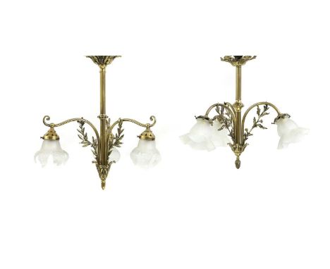 A Edwardian three light brass and frosted glass chandelier early 20th century, suspended from a ceiling rose,50cm hightogethe