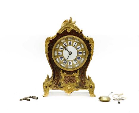 A Boulle work mantel clock,  late 19th century, French, the gilt-metal dial with porcelain insets, the waisted case with appl