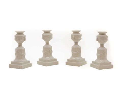 A set of four Royal Copenhagen porcelain candlesticks Classical style, printed marks, 16.5cm high (4)Condition ReportOne cand