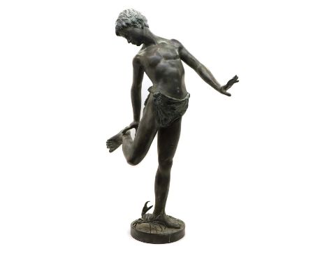 After Annibale De Lotto 'Il Granchio', a spelter figure, modelled as a boy checking his foot, with a crab at the other,89.5cm