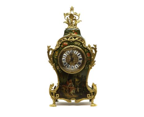 A Louis XV style painted wood mantel clock  late 19th century, surmounted with a gilt metal eagle, above a dial with enamel R