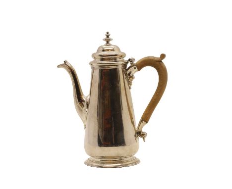 A George III silver coffee pot London 1783, with a turned wood handle, 25cm high 22.76ozt 