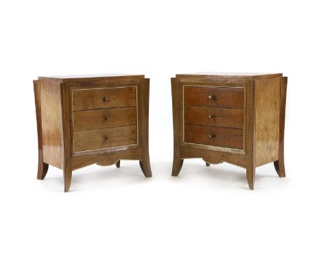 A pair of Art Deco-style maple bedside cabinets 20th century, each rectangular top above three drawers, raised on splayed sup