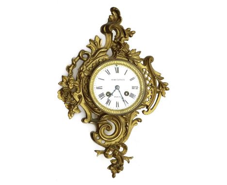 A French cartel clock, 19th century, by Henry-Lepaute Paris, the enamel dial with Roman numerals, minute track and bell strik