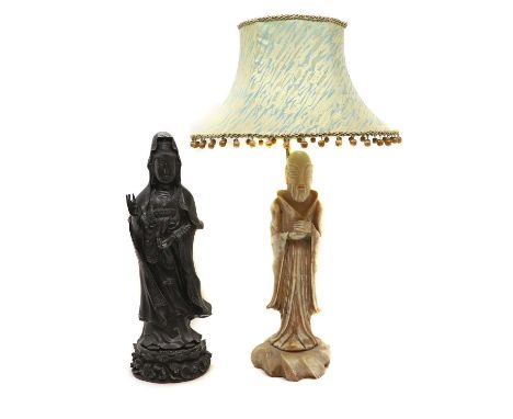 A Chinese bronze figure of Guanyin  of recent manufacture, character marks to the base, 75cm high together with a soapstone f