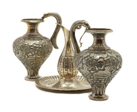 A silver ewer and basin possibly Turkish, marked 800, the ewer 14cm high the basin 15.5cm diameter together with a pair of si