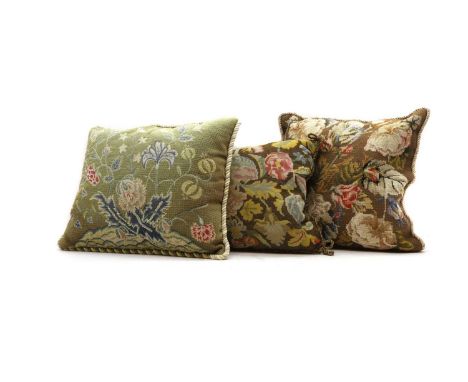 A group of three needlework cushions to include examples by Chelsea Textiles, in gros and petit point, with various floral de