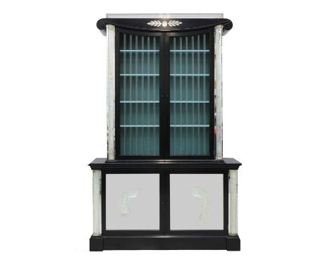 An Art Deco Hollywood Regency ebonised bookcase, 1920s, American, designed by Lorin Jackson, in two sections, the top with an