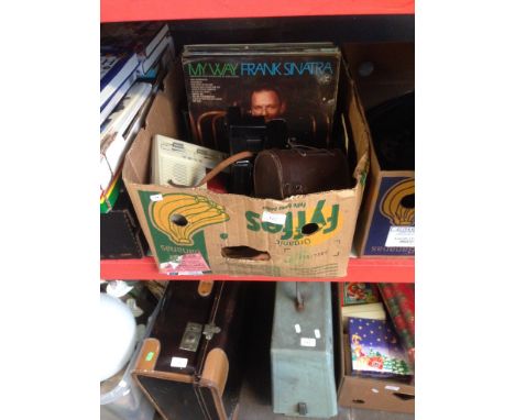 RADIO, POLAROID CAMERA, BINOCULARS, LPS, CDS ETC