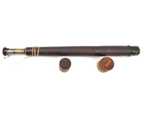 A single draw brass telescope by W Ottway & Co Ltd Ealing, London No 1899”, etc, brown leather covered body, with lens caps, 