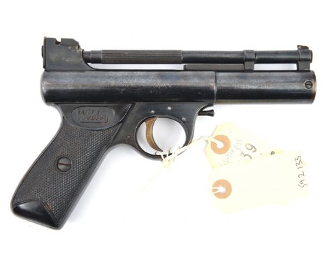 A similar pistol to lot 866, number 962 (1962 beneath grip). GWO & C, retaining most original blued finish (small areas of li