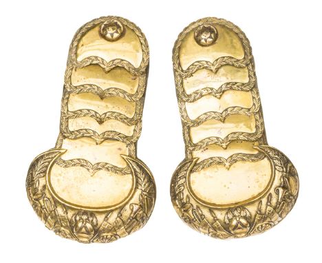 A pair of officer’s gilt shoulder scales of the 13th Light Dragoons, embossed trophies to crescents, floral  borders to scale