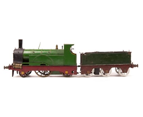A scratch built gauge 3 (2.5" gauge) live steam 2-2-2 tender locomotive. Built by W. Briggs. This spirit fired model features