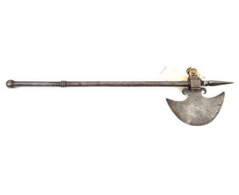 A small Indian axe,  swollen crescent shaped blade 5½”, with faint traces of decoration, into square head with screw in brass