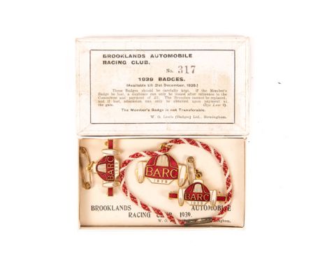 A box of 3 enamelled Brooklands Automobile Racing Club badges for 1939 by W.O. Lewis, Birmingham. Comprising a pendent member
