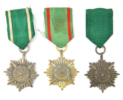 Three Third Reich “Ostvolk” medals, 2nd class in bronze, silver (oxidised to dull grey), and gilt (very slightly oxidised), w