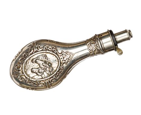 An unusual all white metal powder flask, featuring 3 horse heads in ornamental oval on one side and scrolled panel on the oth