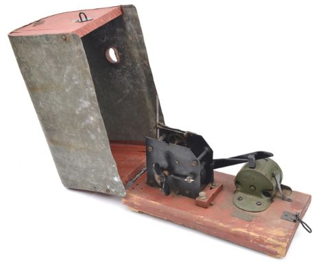 An interesting bird scarers c 1870, clockwork mechanism which fires pinfire blanks at intervals, in tin case (worn), maker’s 
