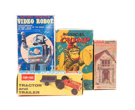 3 tinplate items. A Japanese SH battery operated Video Robot with walking action and big screen. A Japanese ALPS Musical Chim