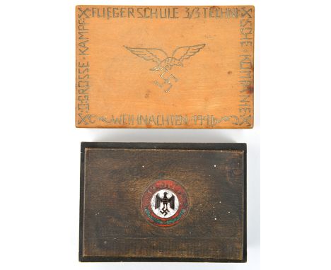 A wooden cigarette box, the lid carved with a Luftwaffe eagle and inscription around the edge to “Flieger Schule 3/3” and dat