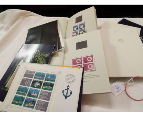 A selection of booklets containing first day covers mainly Swedish