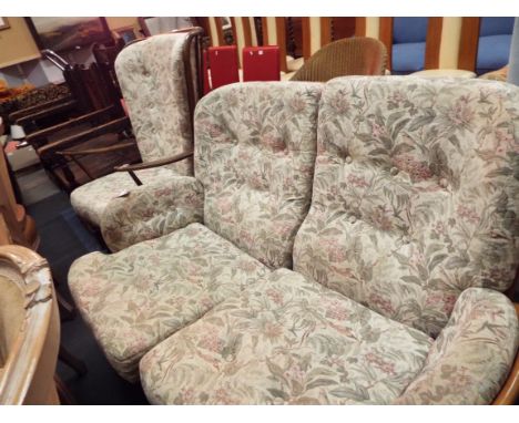 An Ercol two-seater settee and armchair