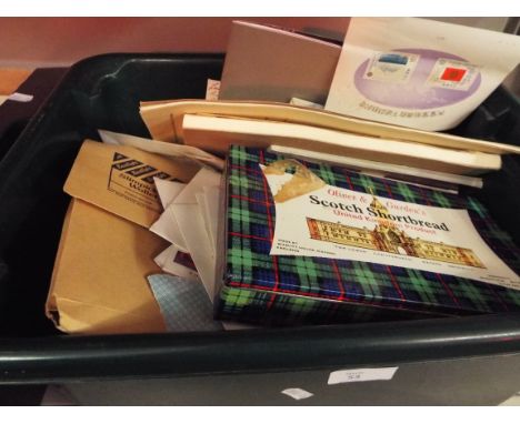 A box of mainly first day covers together with various loose stamps