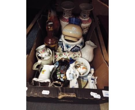 Mixed ceramics to include a pair of oriental vases, a jug in the form of a mallard, a Bell's Wade whisky decanter, collector'