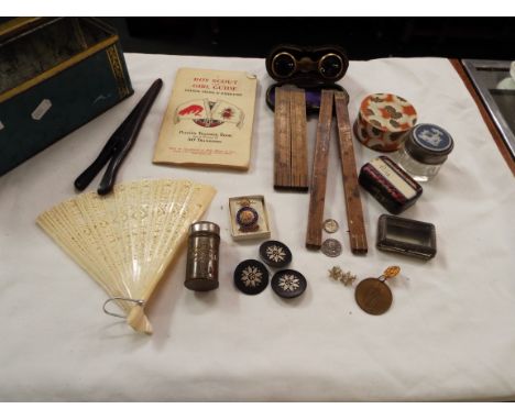 A tin of assorted collectables to include ivory cased opera glasses, rulers, medallion, coins, Jasper ware lidded pot etc