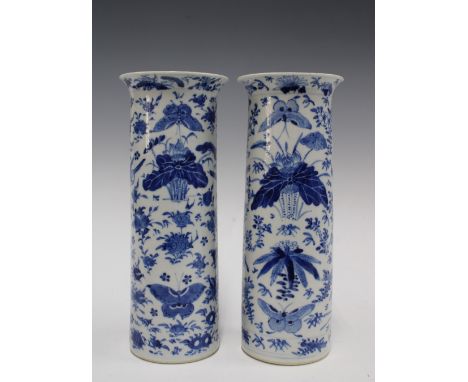A pair of Chinese blue and white sleeve vases, with birds and butterfly pattern, Kangxi marks but likely later (2) 11 x 27cm.