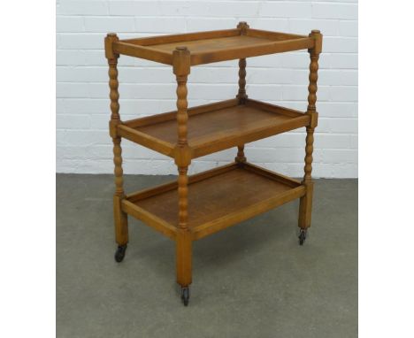 An oak three tier buffet trolley with bobbin supports, , 61 x 80 x 38cm. 
