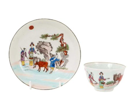 A Worcester tea bowl and saucer, circa 1758, printed and painted with the 'Red Bull' pattern, black line border, the saucer 1