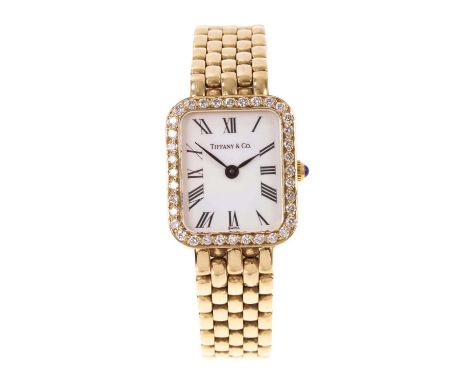 Tiffany &amp; Co 14ct gold and diamond ladies' quartz wristwatch, the rectangular white enamel dial with Roman numeral marker