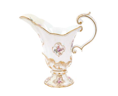 A large Chelsea helmet-shaped ewer, after a Meissen original, circa 1758-60, polychrome painted with floral sprays in moulded