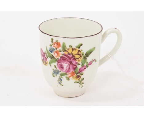A Derby flower painted coffee cup, circa 1770, with dark red lined rim, 6.75cm highGood overall condition. The footrim is chi