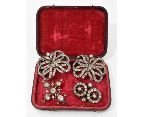 Four Georgian paste-set brooches to include a pair of ribbon bow brooches converted from buckles