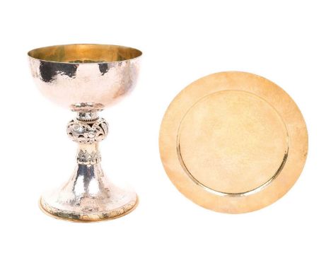 Contemporary silver Communion chalice, with spot hammered finish and stem with pierced foliate knop, on a pedestal base, with