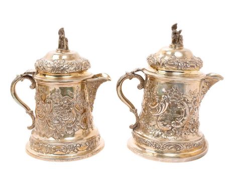 Edwardian silver tankard, with embossed decoration and engraved "LDRA THE McCALMONT CUP 1907", loop handle and hinged cover (
